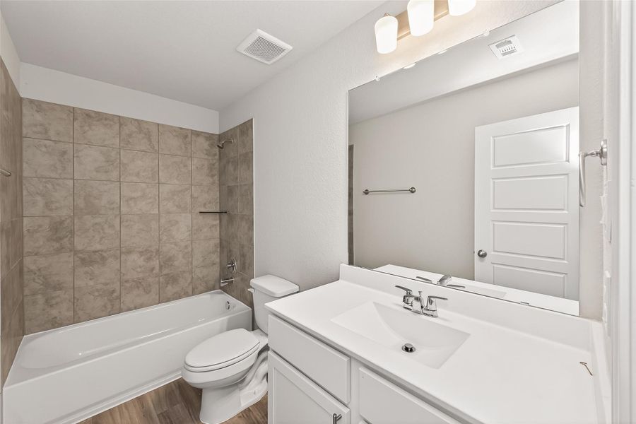 Furnished interior view inside a new home in Woodland Lakes, Houston (Image 12).