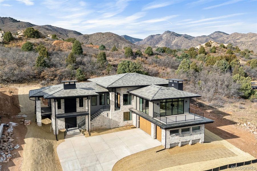 Front exterior of a new home in , Littleton, CO, highlighting curb appeal (Image 2).