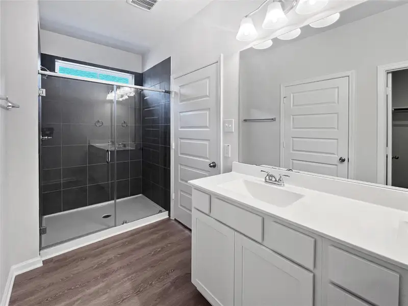 The Blue Jay II- Primary Bath. Home under construction, photo used for illustrative purposes only, colors and options will vary.