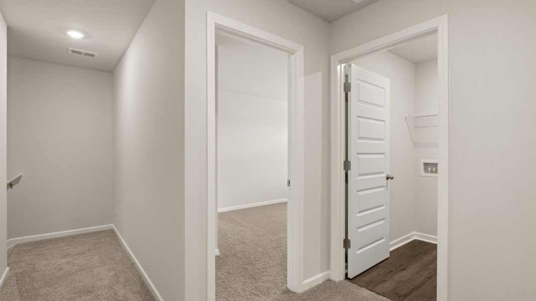 Representative unfurnished interior of a home built from the ANSLEY Express by D.R. Horton in WillowBrook, Winder (Image 23).