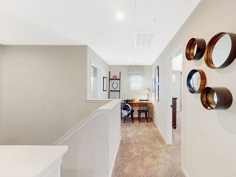 A room with a table and chairs. A room with a table and chairs.