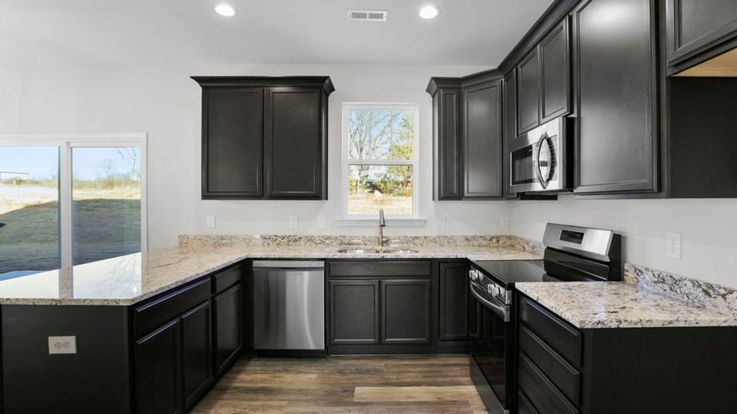 Furnished interior view inside a new home in Edgewood Estates, Greenville (Image 7).