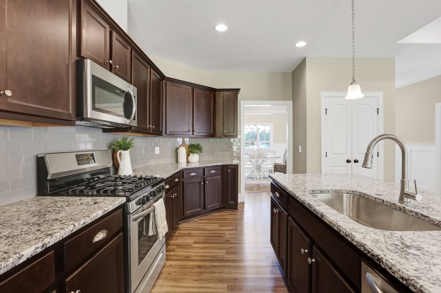 Representative furnished interior of a home built from the Sinclair by Bill Clark Homes in Osprey Landing, Southport (Image 10).
