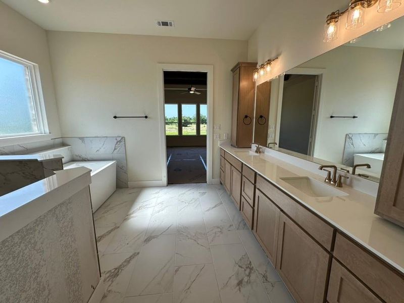 Furnished interior view inside a new home in Fannin Ranch, Leonard (Image 6).