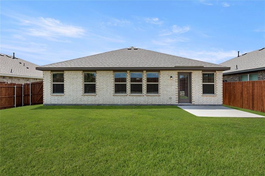 Front exterior of a new home in Northspur, Terrell, TX, highlighting curb appeal (Image 17).