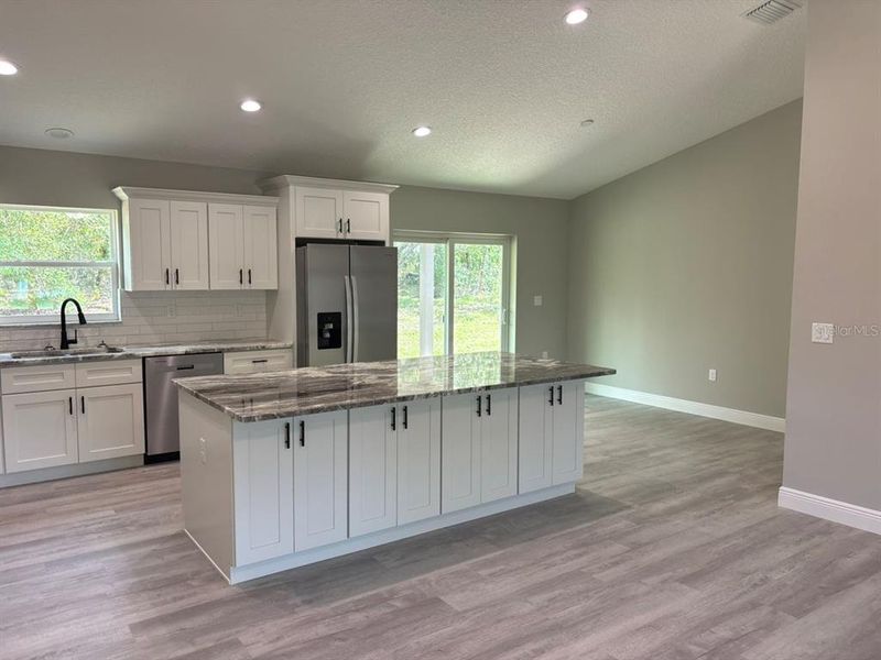 Furnished interior view inside a new home in , Dunnellon (Image 7).