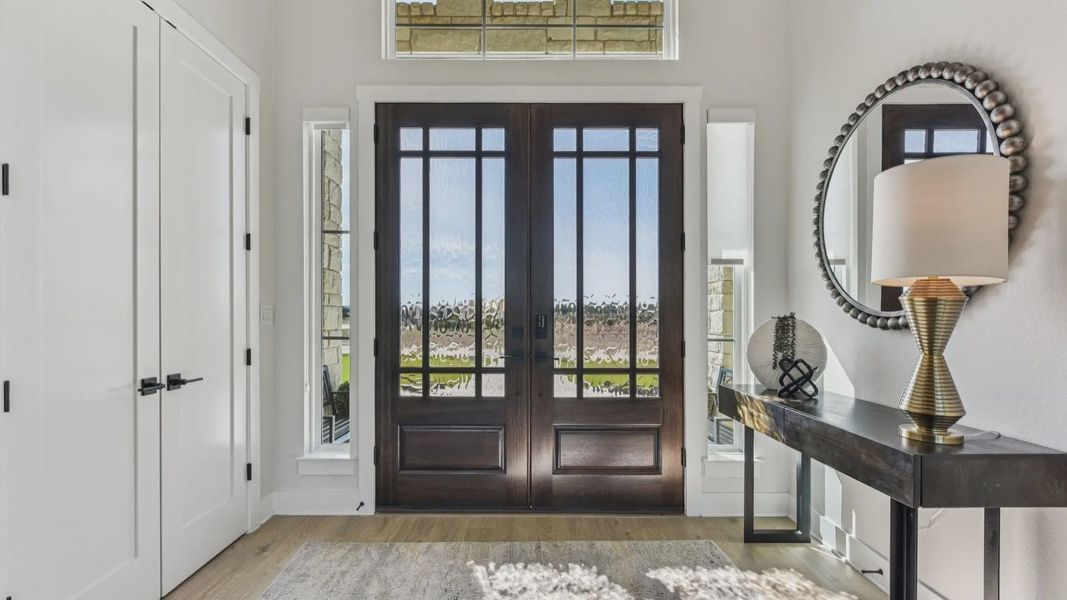 Representative furnished interior of a home built from the Garet by Chesmar Homes in Feathergrass, Florence (Image 5).