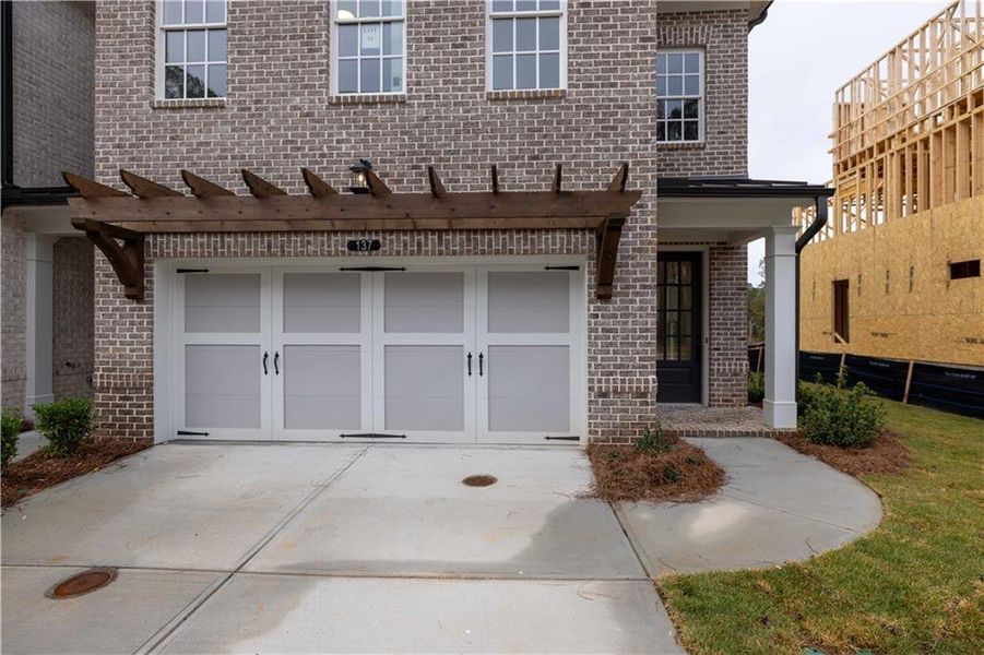 Exterior details and patio area of a home in Waterside Townhomes, Peachtree Corners (Image 24). Exterior details and patio area of a home in Waterside Townhomes, Peachtree Corners (Image 24).