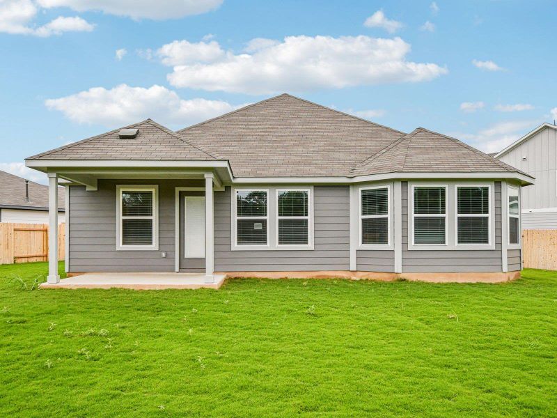 Back of house with a patio and roof with shingles Back of house with a patio and roof with shingles