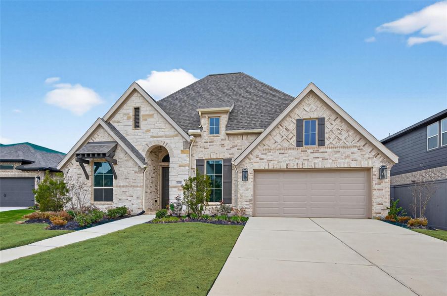 Front exterior of a new home in , Hockley, TX, highlighting curb appeal (Image 2). Front exterior of a new home in , Hockley, TX, highlighting curb appeal (Image 2).