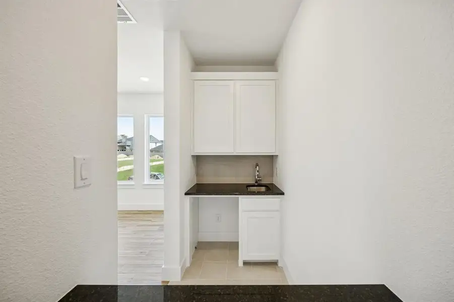 Your new wet bar makes hosting those big game day parties a breeze!