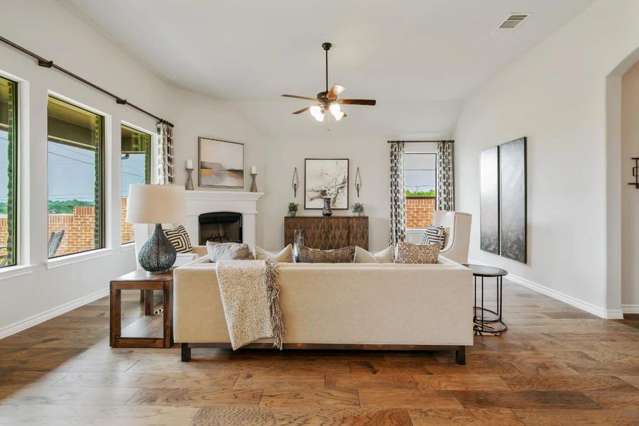 Family Room | Concept 2434 at Coyote Crossing in Godley, TX by Landsea Homes