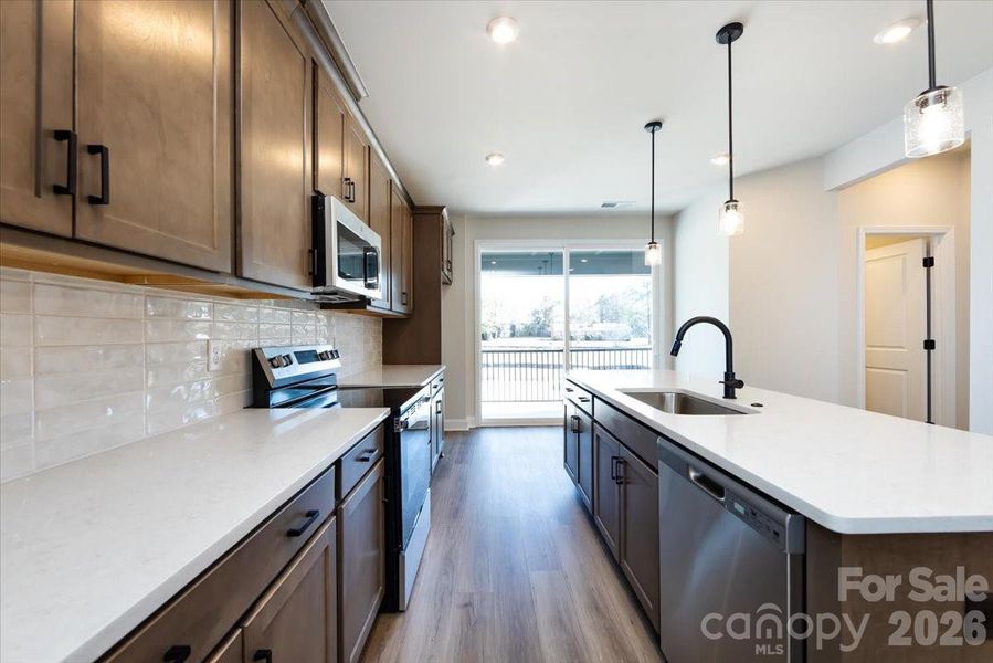 Chef Inspired Kitchen with Oven Range, Microwave and Dishwasher Chef Inspired Kitchen with Oven Range, Microwave and Dishwasher