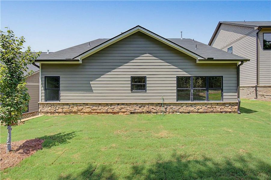 Exterior details and patio area of a home in Meadow Pines, Dallas (Image 18).