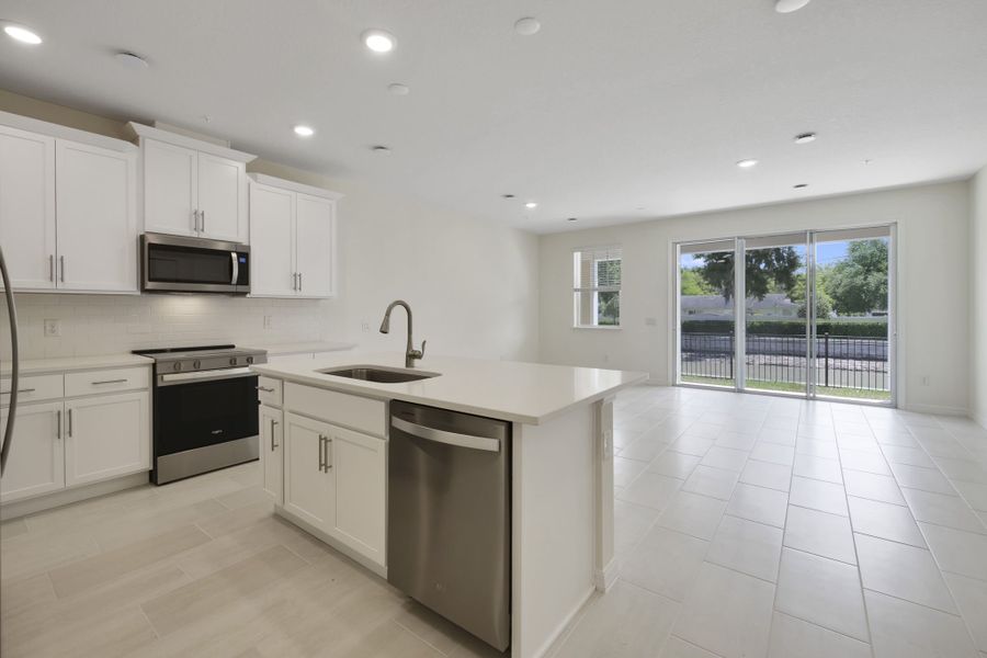 Furnished interior view inside a new home in Towns at Riverwalk, Sanford (Image 8). Furnished interior view inside a new home in Towns at Riverwalk, Sanford (Image 8).
