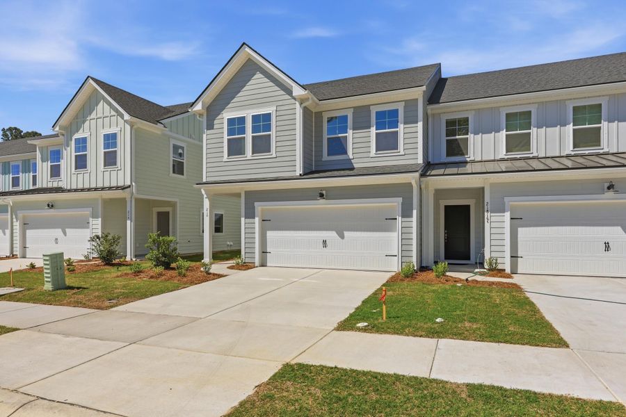 Front exterior of a new home in , Charleston, SC, highlighting curb appeal (Image 1). Front exterior of a new home in , Charleston, SC, highlighting curb appeal (Image 1).