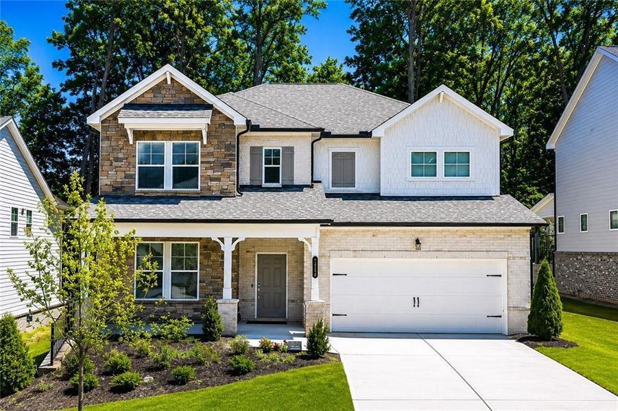 Front exterior of a new home in Bailey Fence, Dacula, GA, highlighting curb appeal (Image 22).