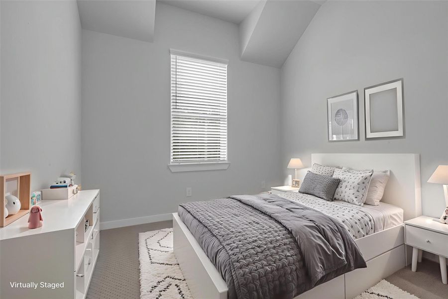 Third bedroom suite with tall ceilings.