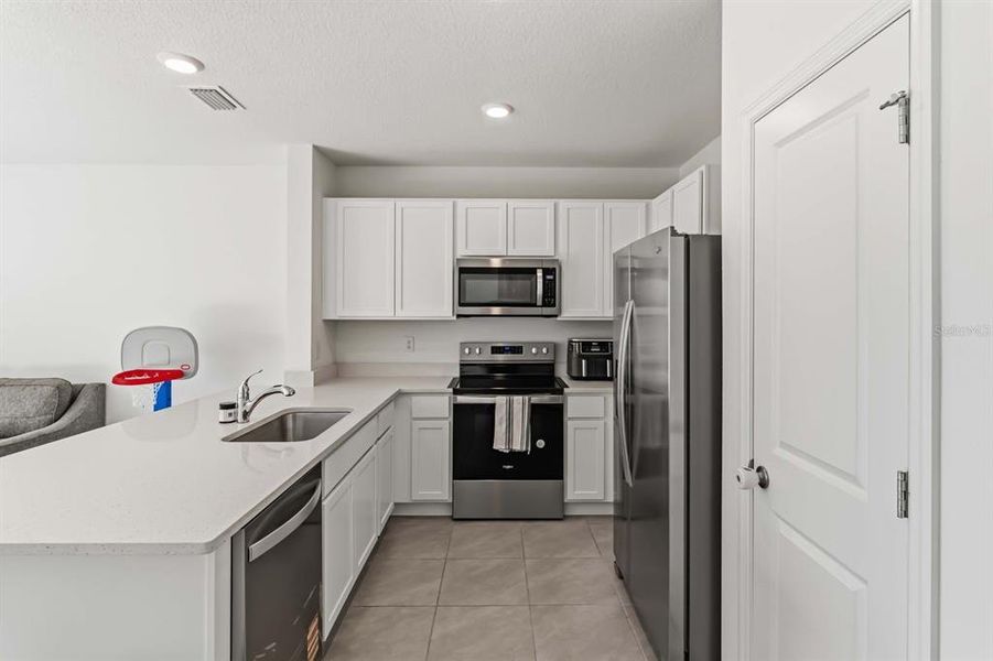 Furnished interior view inside a new home in , Tampa (Image 6).