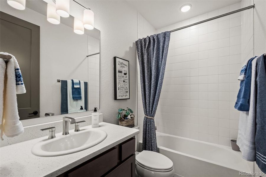 Furnished interior view inside a new home in Revel Crossing at Wolf Ranch - The Panorama Collection, Colorado Springs (Image 9).