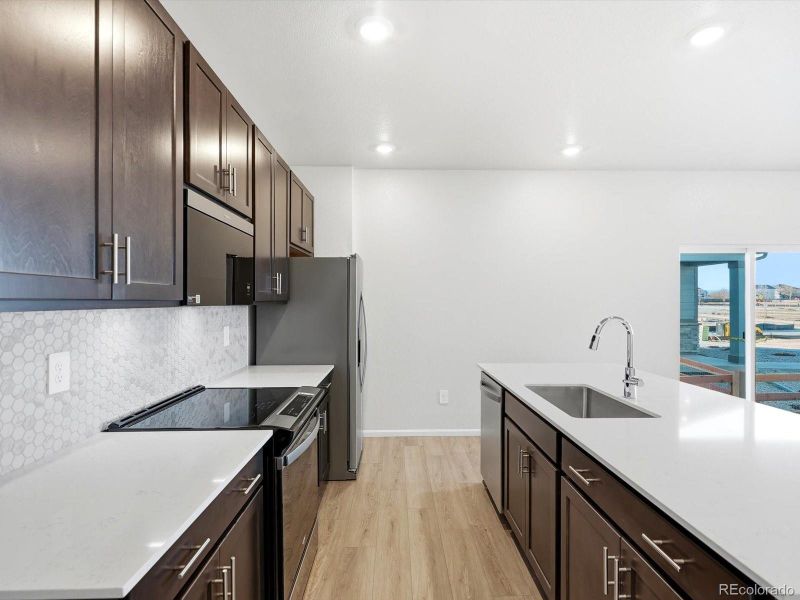 Furnished interior view inside a new home in , Thornton (Image 8).