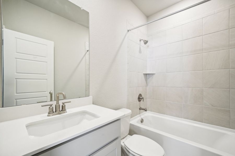 Guest bathroom in the Preston floorplan at a Meritage Homes community.