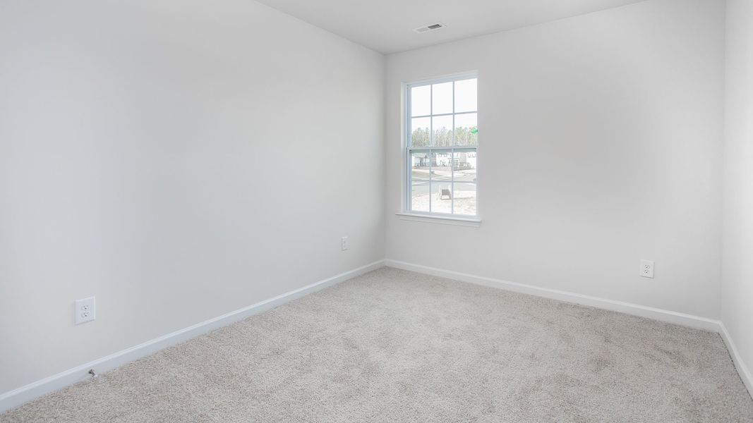 Spacious, unfurnished interior of a new home in The Gables at Edinborough Townes, Gibsonville (Image 18).