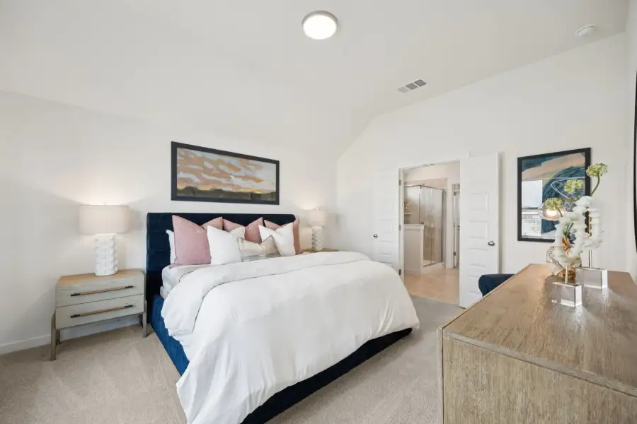 Primary Suite in the Diamond home plan by Trophy Signature Homes – REPRESENTATIVE PHOTO