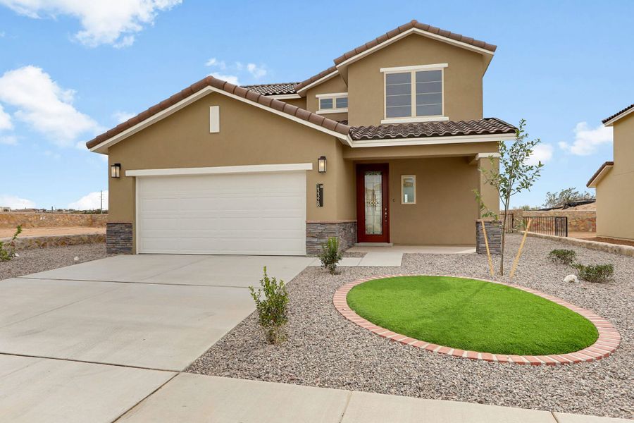 Front exterior of a new home in Emerald Estates, Horizon City, TX, highlighting curb appeal (Image 2). Front exterior of a new home in Emerald Estates, Horizon City, TX, highlighting curb appeal (Image 2).