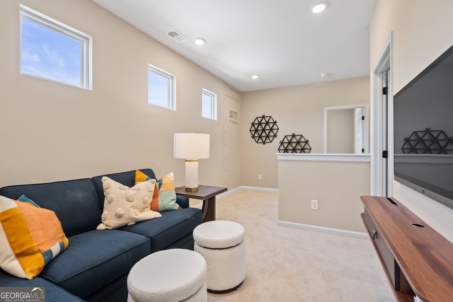 Furnished interior view inside a new home in Glendale Towns, Conyers (Image 22).