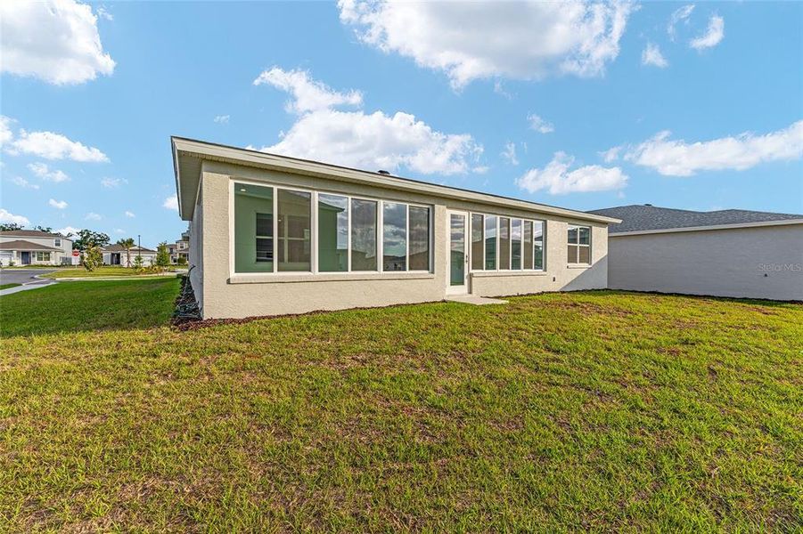 Exterior details and patio area of a home in Calesa Township, Ocala (Image 4).