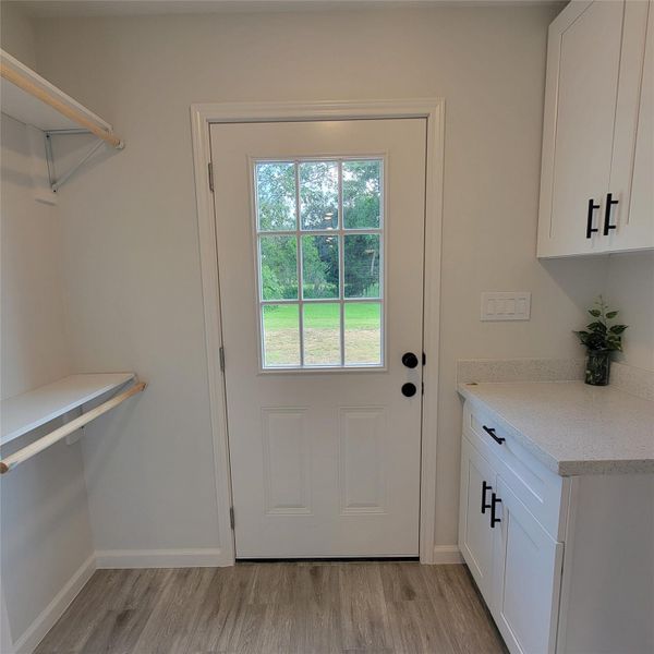 UTILITY ROOM VIEW FROM THE KITCHEN AREA