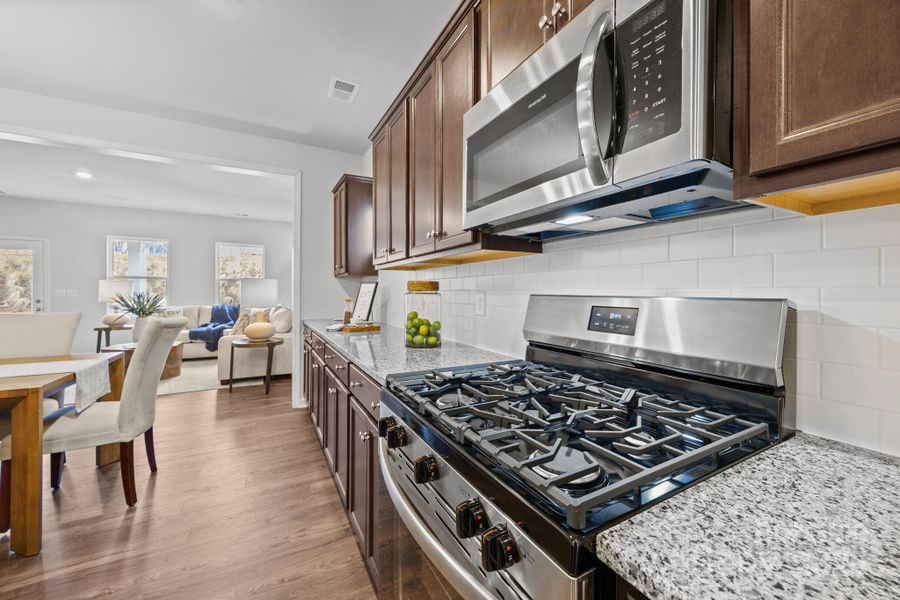 Furnished interior view inside a new home in McFarland Estates, York (Image 12).