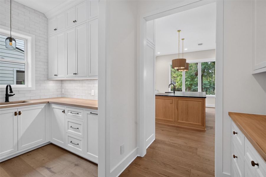 Furnished interior view inside a new home in , The Woodlands (Image 6).