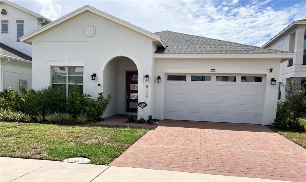 Front exterior of a new home in , St. Cloud, FL, highlighting curb appeal (Image 16).