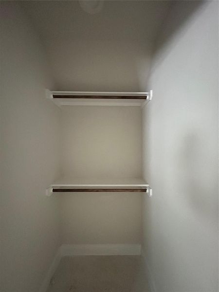 Secondary bedroom closet Secondary bedroom closet