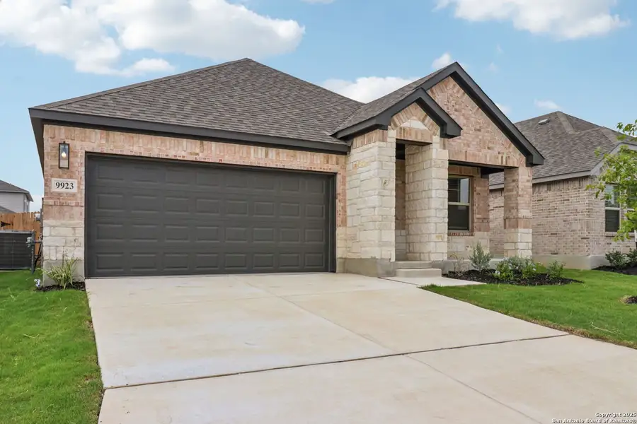 Front exterior of a home in the Kallison Ranch community, located in San Antonio, TX (Image 16).