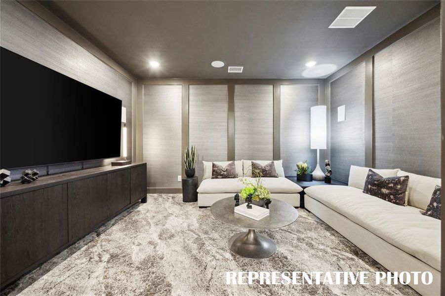 With a main floor media room, our Sophie plan offers outstanding entertaining spaces.  REPRESENTATIVE PHOTO