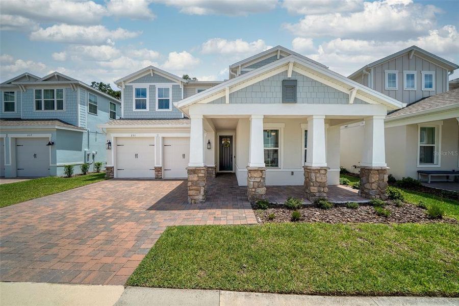Front exterior of a new home in , Orlando, FL, highlighting curb appeal (Image 2).