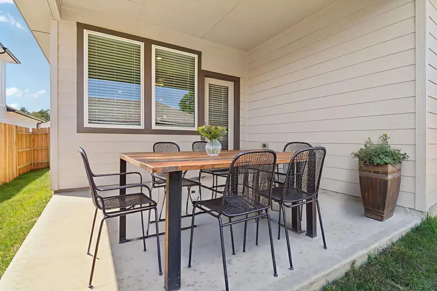 Exterior details and patio area of a home in Pine Lake Cove - Traditional Series, Montgomery (Image 2).