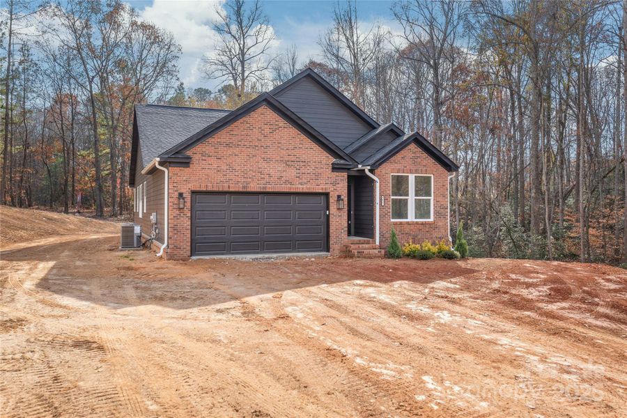 Front exterior of a new home in , Lincolnton, NC, highlighting curb appeal (Image 1). Front exterior of a new home in , Lincolnton, NC, highlighting curb appeal (Image 1).