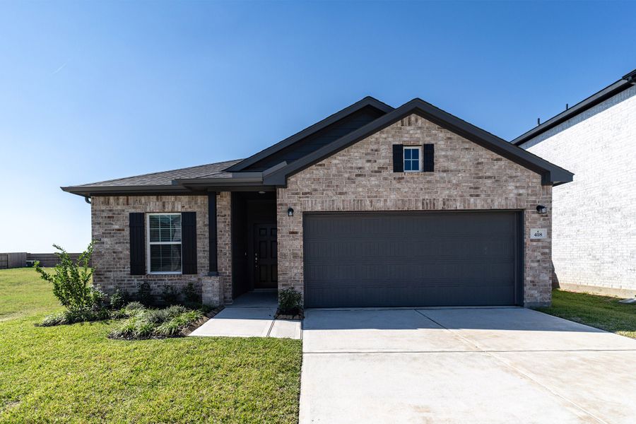 Front exterior of a new home in Emberly, Beasley, TX, highlighting curb appeal (Image 1). Front exterior of a new home in Emberly, Beasley, TX, highlighting curb appeal (Image 1).