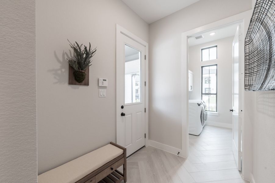 Representative furnished interior of a home built from the Carignan by Tri Pointe Homes in Sienna 80′, Missouri City (Image 14).
