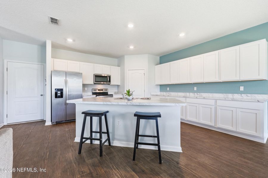 Furnished interior view inside a new home in Ravenswood Village, St. Augustine (Image 28).