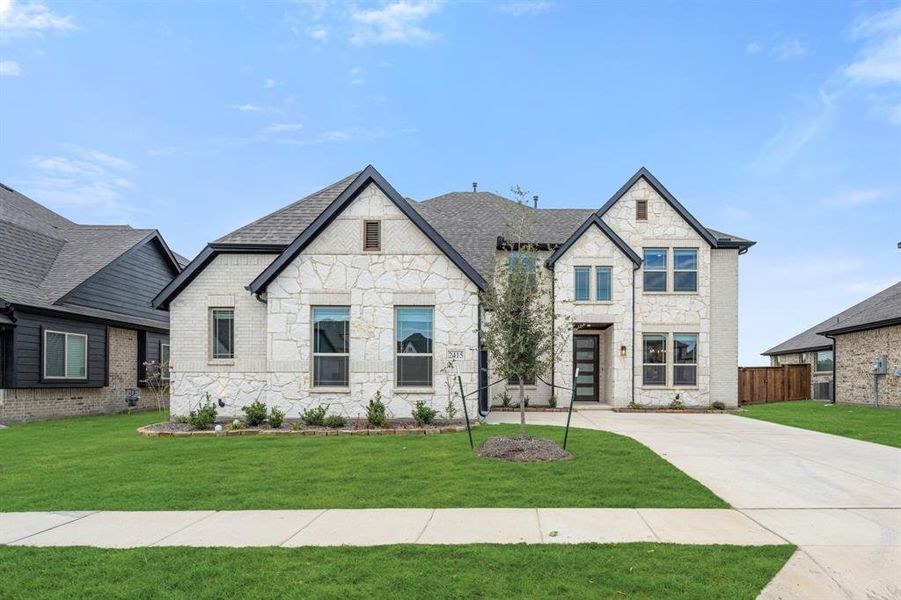 Front exterior of a new home in Devonshire Classic 60-65, Forney, TX, highlighting curb appeal (Image 2).