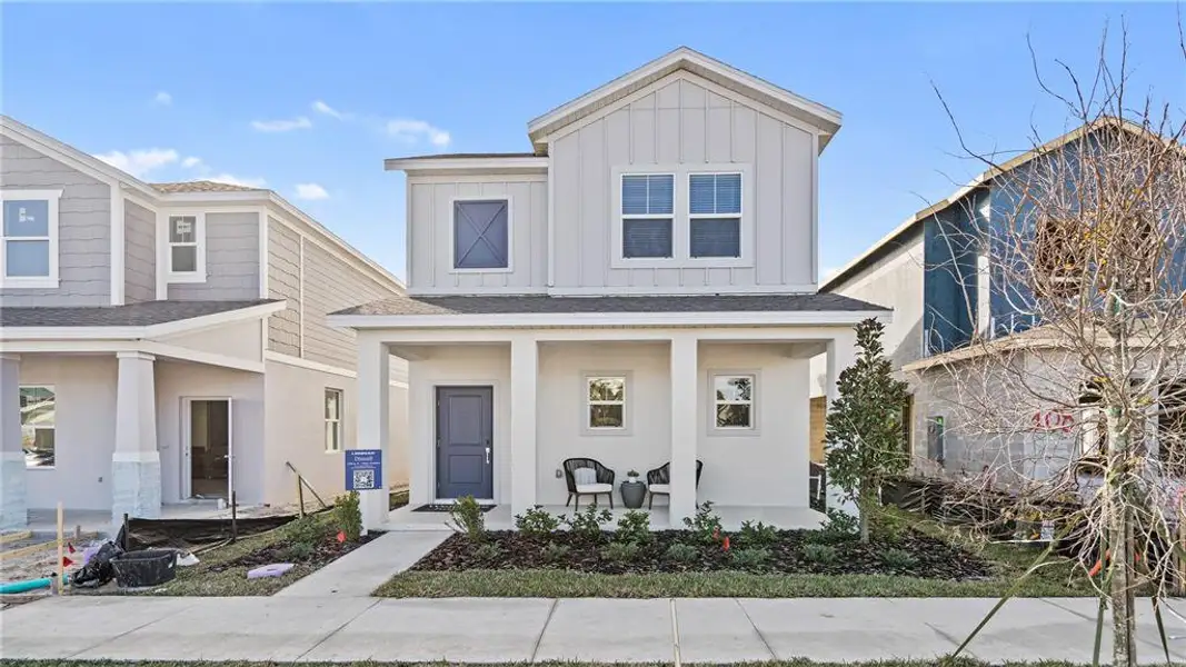 Front exterior of a new home in , Apopka, FL, highlighting curb appeal (Image 1). Front exterior of a new home in , Apopka, FL, highlighting curb appeal (Image 1).