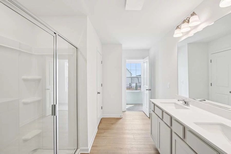 Primary Bathroom featuring Serene Collection Finishes Primary Bathroom featuring Serene Collection Finishes