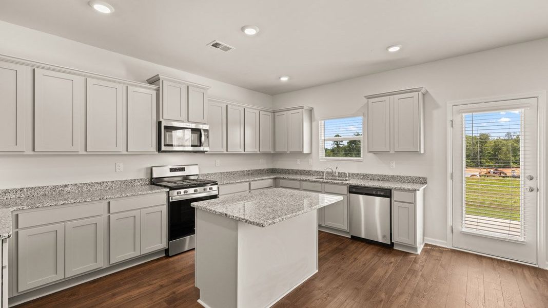Representative furnished interior of a home built from the Grayson by D.R. Horton in Highland Hills, Graniteville (Image 4).