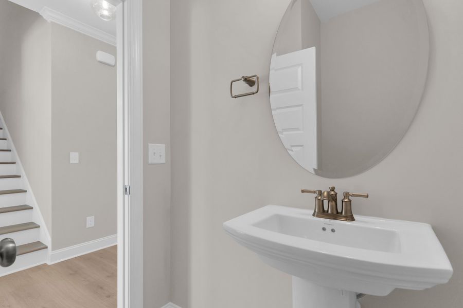 Representative furnished interior of a home built from the The Bradley by RobuckHomes in Windwater, Hampstead (Image 53).