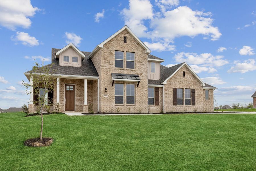 Front exterior of a new home in Ellis Ranch Estates, Waxahachie, TX, highlighting curb appeal (Image 21).